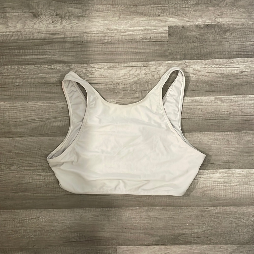 Islander crop top/sports bra, greyish white, flexible and breathable.